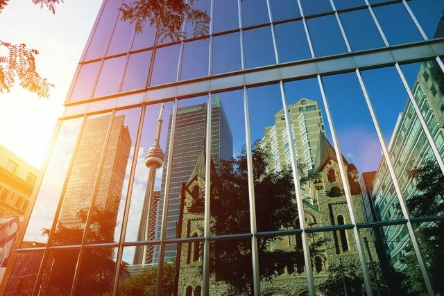 Portrait of downtown Toronto buildings at sunset.