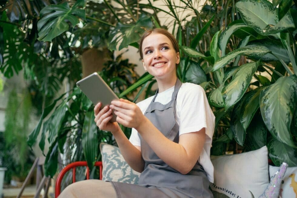 Business owner browsing multilingual ecommerce store on a tablet.