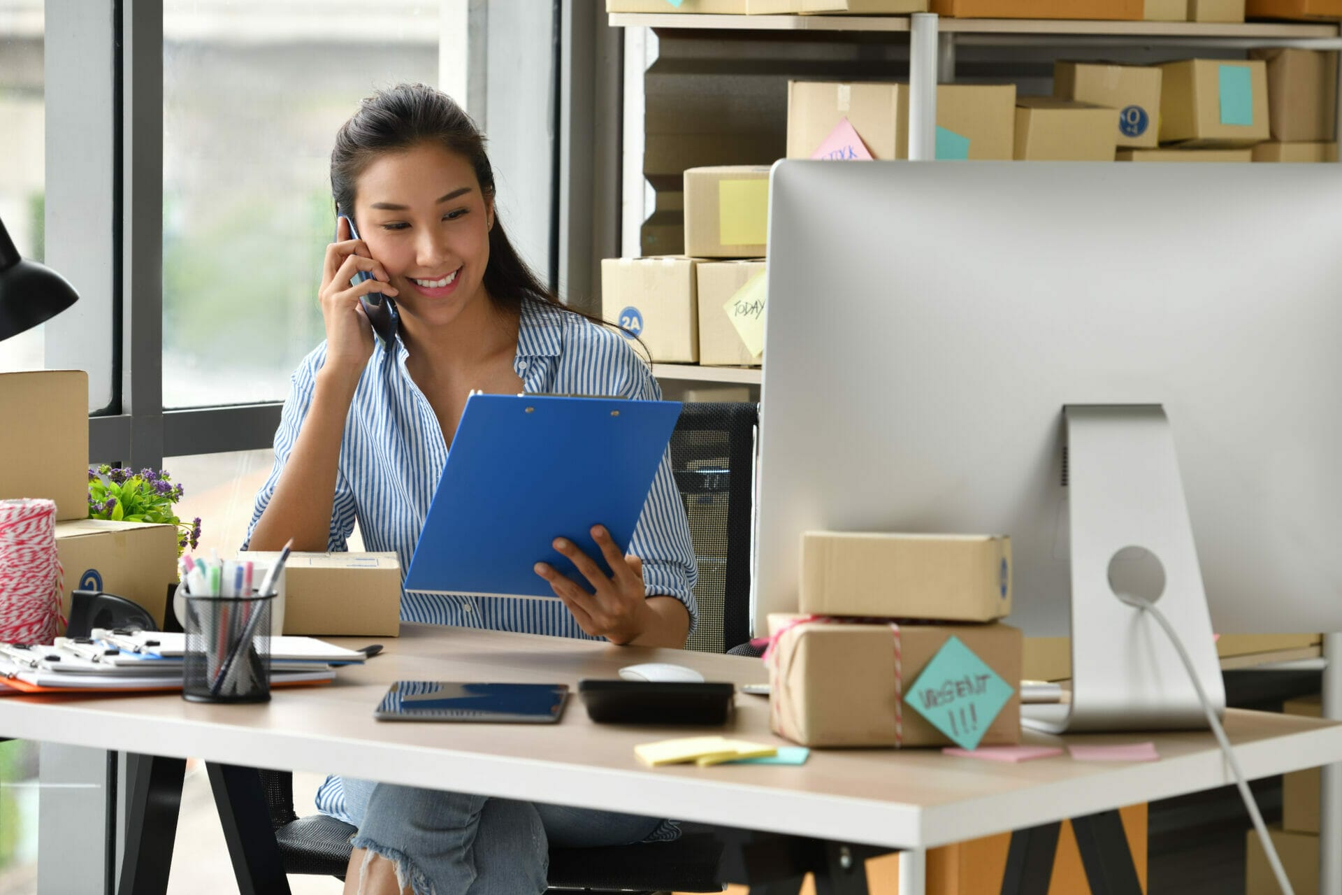 Female entrepreneur browsing bilingual website.