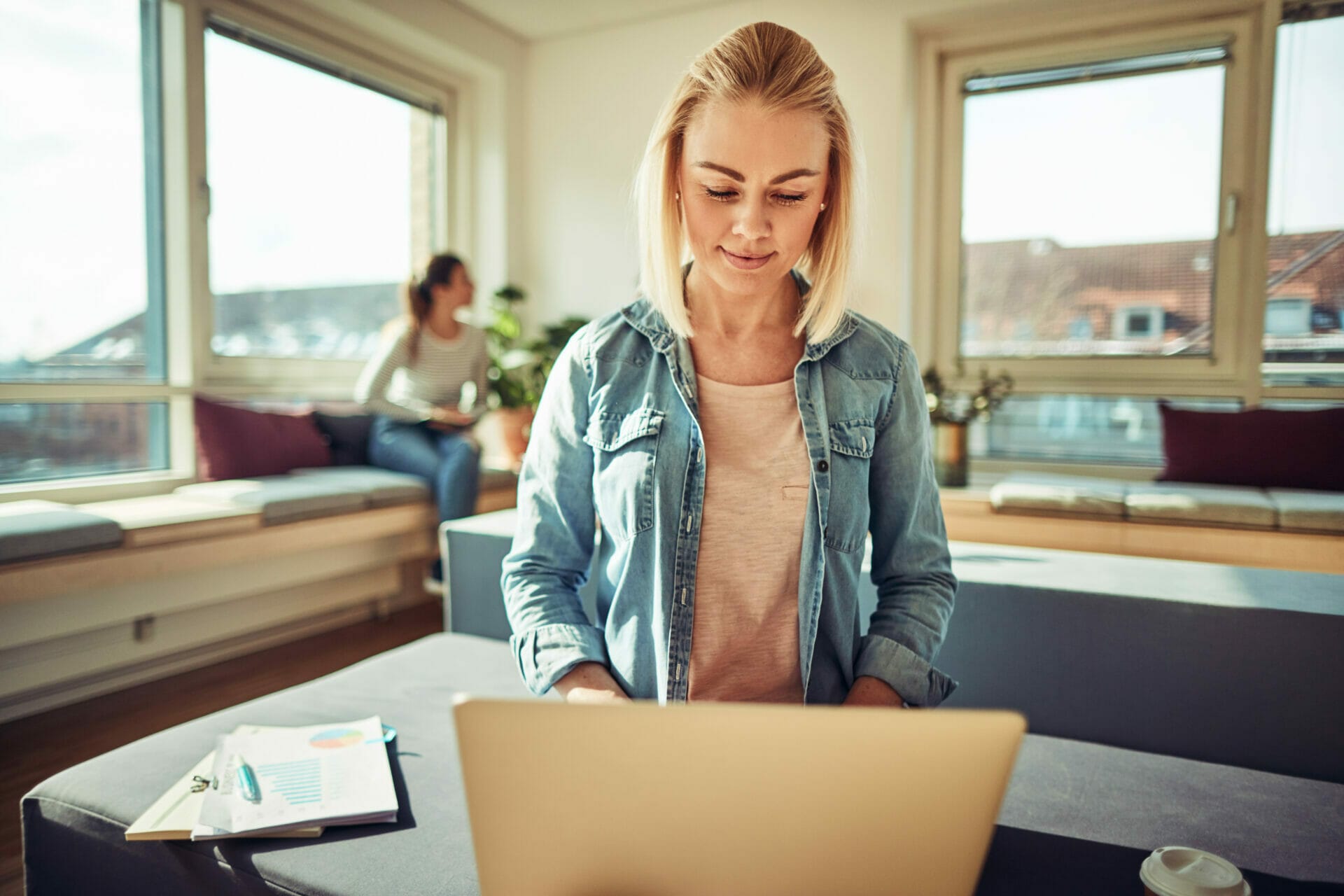 Young business women browsing a AODA compliant website.