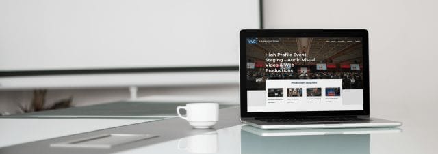 macbook-mockup-in-a-conference-room-a9456